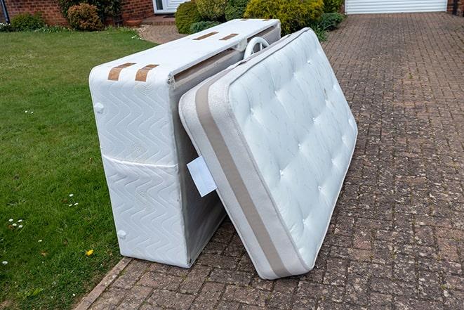 old mattresses being collected for recycling